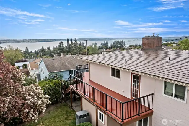 Wrap around deck with access to the backyard.