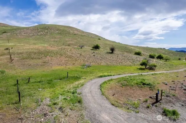 Gentle driveway to your land.