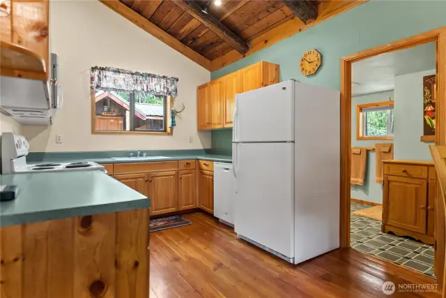 Access your laundry and main floor bathroom beside the kitchen area, adjoining the living room.