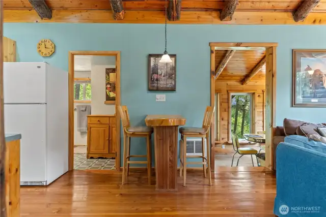 Access to main floor bathroom and sunken dining room can be seen here.