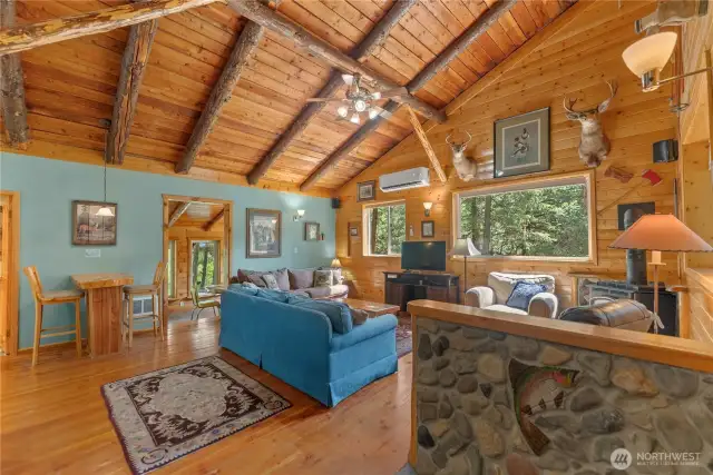 River rock accents and exposed timber beams.