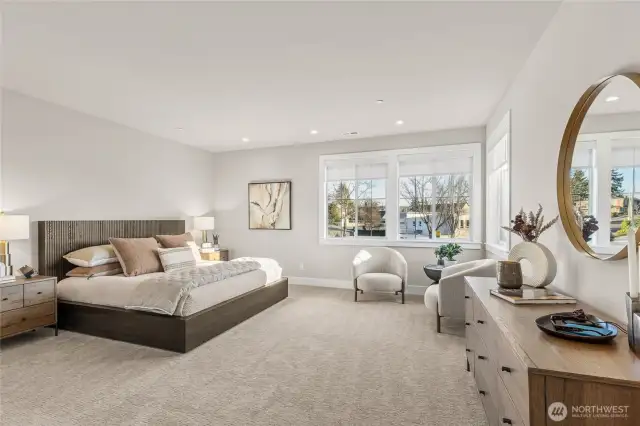 Spacious Primary Suite has views to Mt. Rainier on clear days!