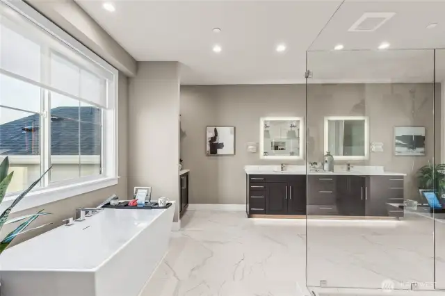 Gorgeous spa bath, with heated flooring, towel warmer - perfect to wind down and relax!