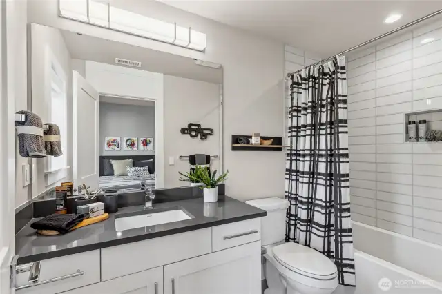 En Suite off upstairs bedroom w/ Tub.