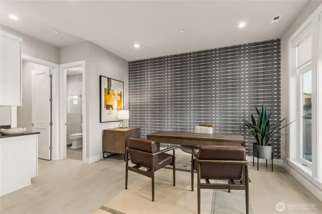 Main floor home office or bedroom w/ en suite bath & walk in closet. Very spacious!