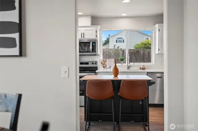 Opens up to the kitchen!