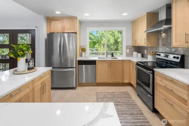 The kitchen has been opened up and fully remodeled.