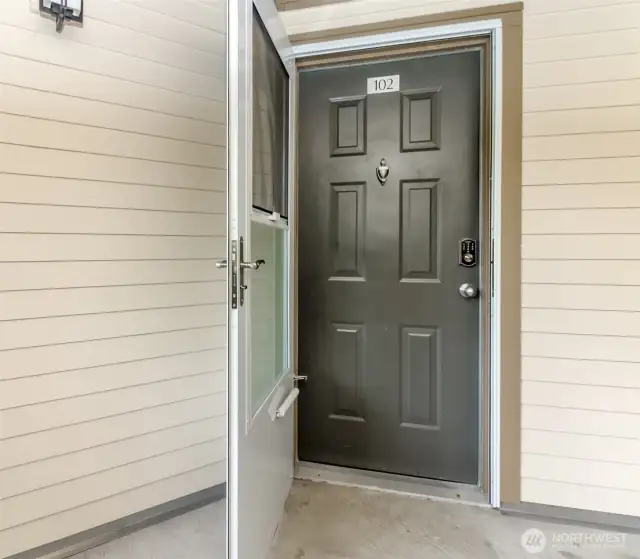 A heavy duty storm door with alternate screen for air circulation.