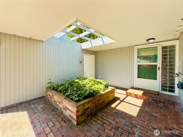 3038 Louisiana St, Longview WA 98632 brick front covered patio, mature landscaping, curbs, sidewalks, walkable neighborhood, skylight