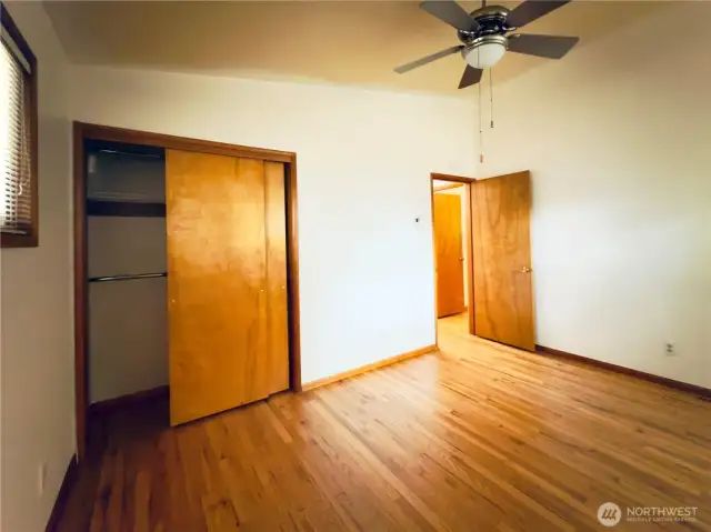 Second bedroom, ceiling fan, vaulted ceiling, hardwood floor, move-in ready