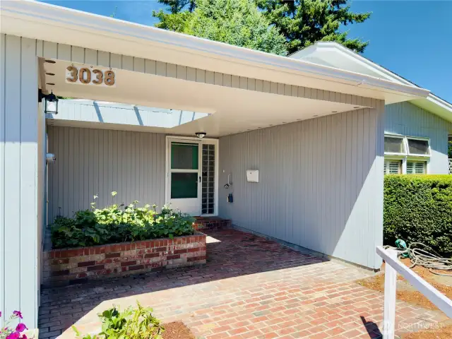 3038 Louisiana St, Longview WA 98632 brick front covered patio, mature landscaping, curbs, sidewalks, walkable neighborhood, skylight
