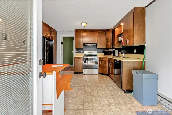 Attached dwelling unit with its own kitchen, bathroom, and laundry.