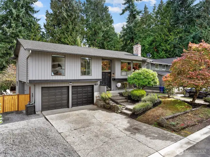 Front of home - fresh exterior paint and landscaping on a quiet culd-de-sac