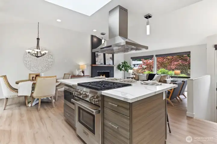Oversized kitchen island with chef inspired kitchen and professional grade appliances Subzero, Wolf, Thermador. Heated floors in kitchen