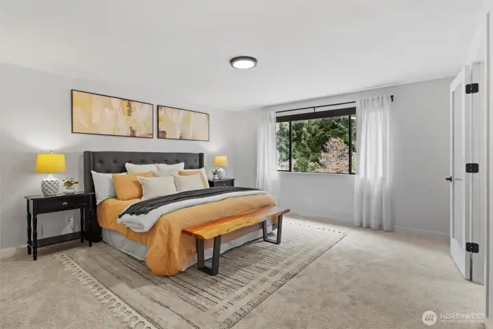 Primary bedroom with 5-piece ensuite bath and large walk-in closet