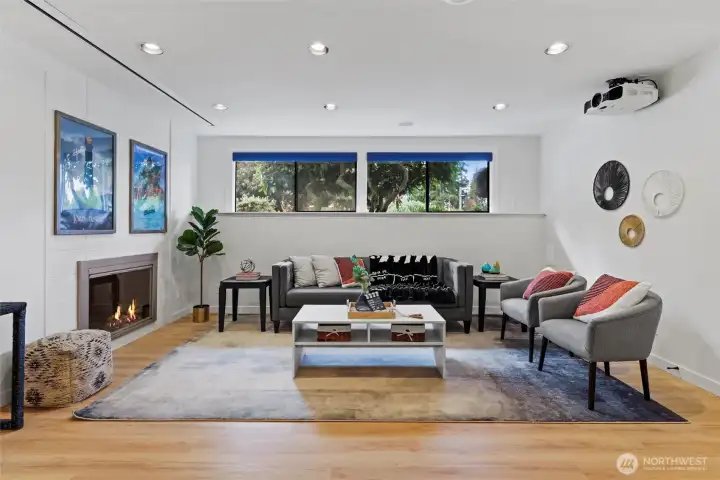 Downstairs rec room with state of the art projector and screen, surround sound speakers