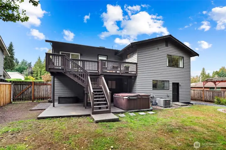 Back of home - entertaining deck, Sundance hot tub, large flat fully fenced lot