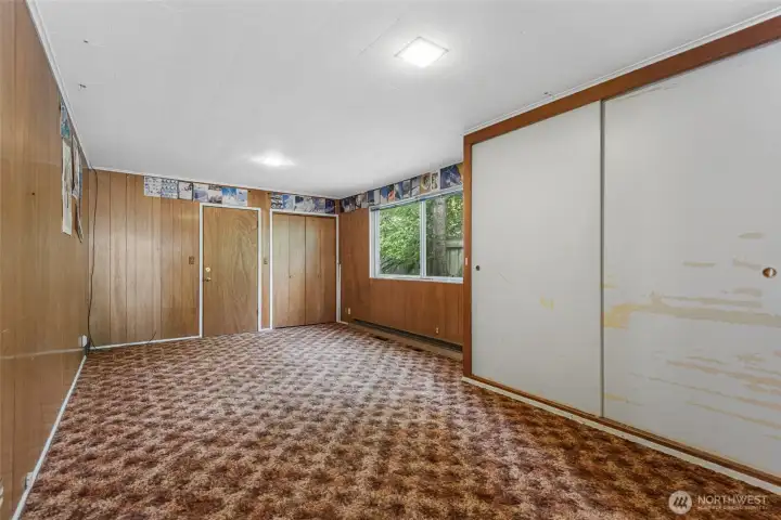 Bedroom 3 w door to back yard.