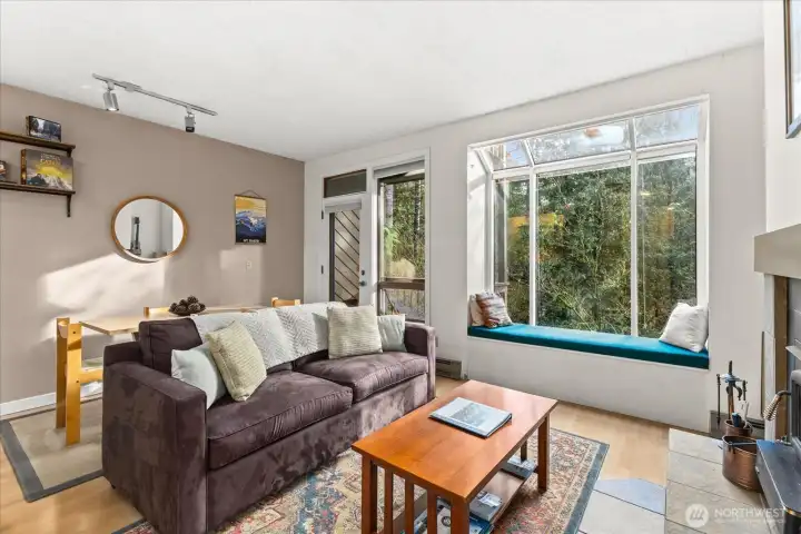 Custom bench seat provides additional seating, storage, and maybe a sleeping spot when you have a full house.