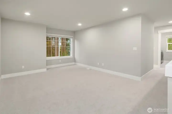 Upper level landing doubles as a bonus room