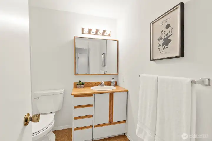 Main bathroom with tub upstairs.