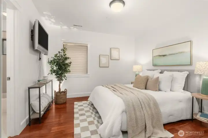 Second ensuite bedroom with private bathroom at left.