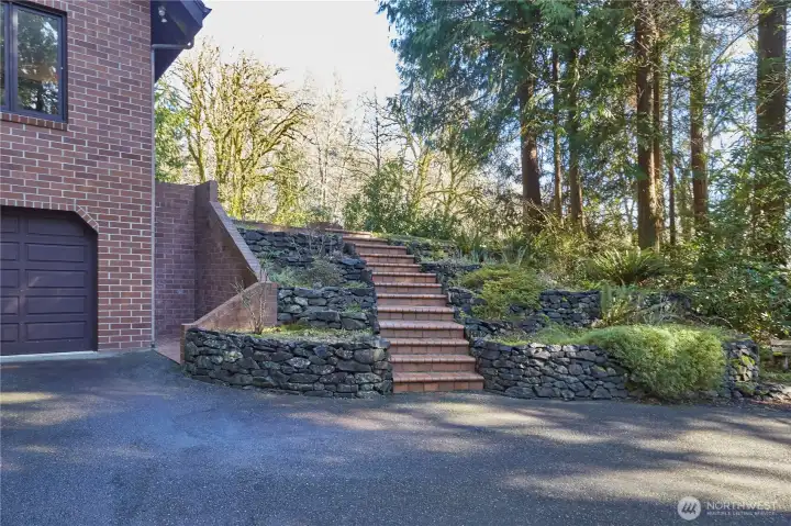 Custom brick throughout exterior of home and grounds.