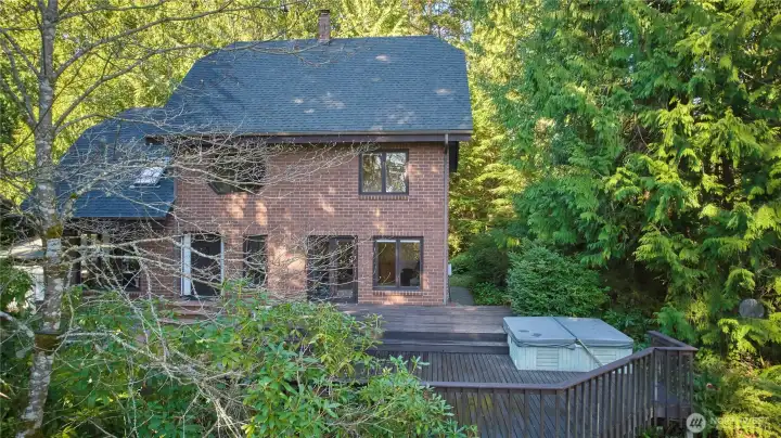 Front of home, deck space looking from over ravine.