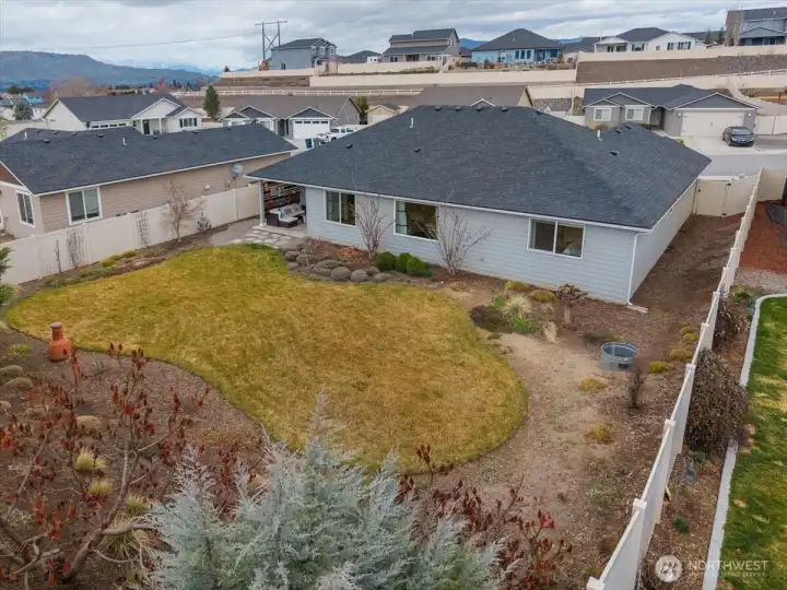 Professionally landscaped and manicured backyard.