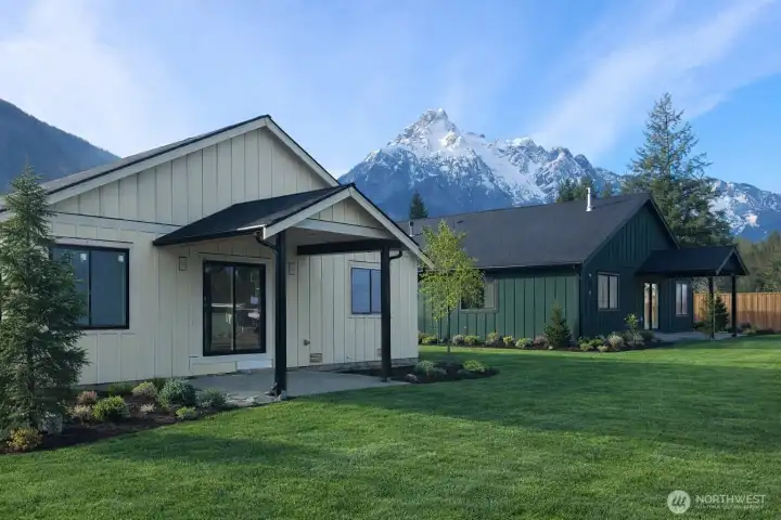 Back of home - AI representing landscaping - similar to be completed prior to closing.