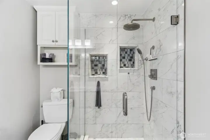 Custom shower with tile accents.