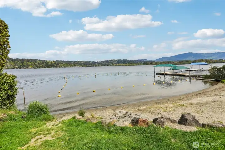 Whether you’re launching a kayak, swimming off the sandy platform, or hosting a summer picnic, this home is steps to the best of lakeside living.