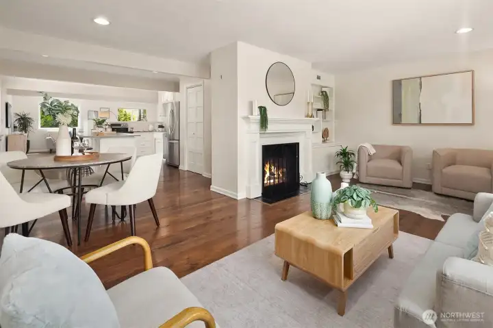 Seamless flow between living room, dining area and kitchen.