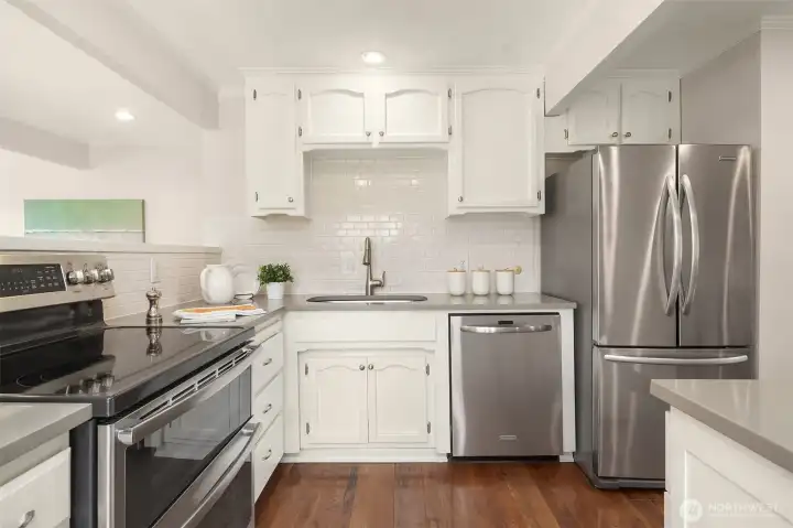 Kitchen with ample cabinet storage.