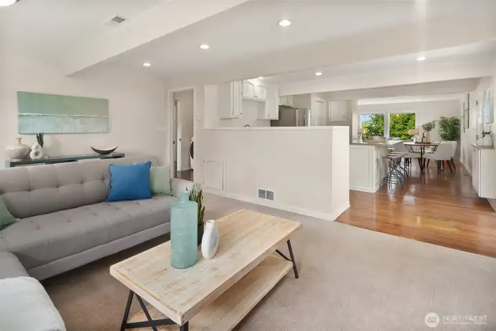 Seamless flow between family room & kitchen.