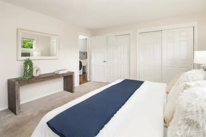 Primary bedroom featuring dual closets.