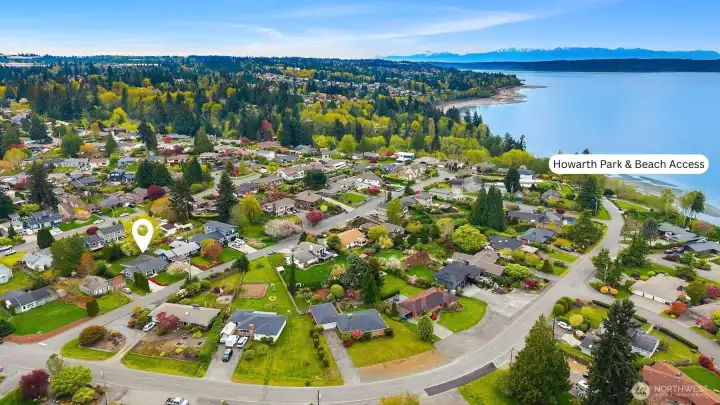 Aerial photo facing Southwest showcasing close proximity to Howarth Park with beach access.