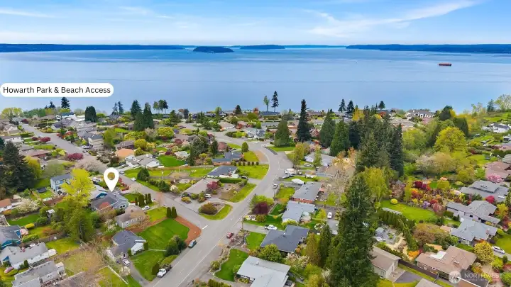 Aerial photo facing West showcasing close proximity to Howarth Park with beach access.