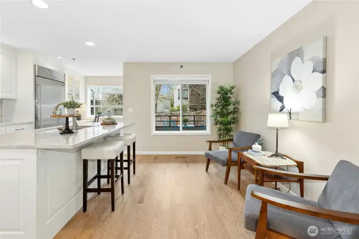 The spacious island kitchen has been totally remodeled and offers a breakfast bar.