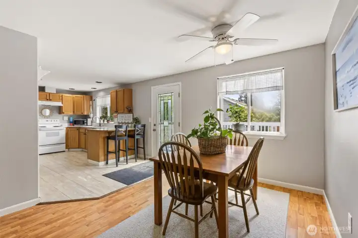 Large dining area connecting family room to spacious kitchen