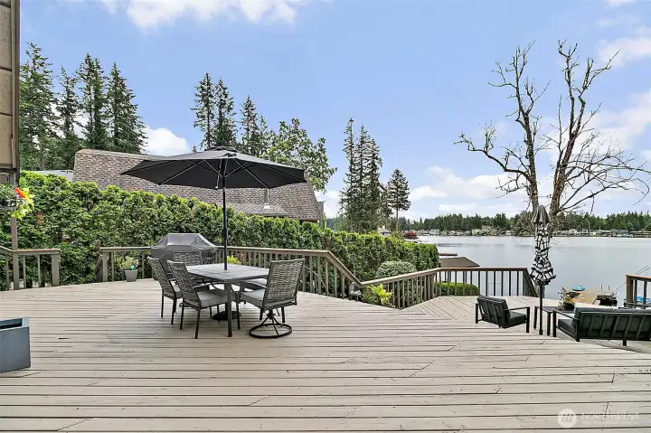 Two-tier deck overlooking Lake Sawyer with space to relax or entertain.