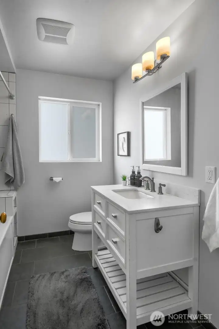 Bathroom on main floor with shower/tub cominbination. Bathroom on main floor with shower/tub cominbination.
