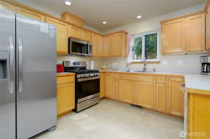 Newer stainless steel appliances and sink.