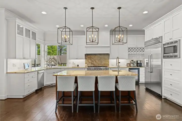 Chefs kitchen opens up to the family room access to deck Chefs kitchen opens up to the family room access to deck