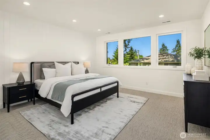 Designer primary suite with five-piece bath with heated floors Designer primary suite with five-piece bath with heated floors