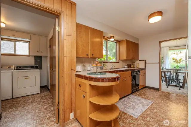 This photo shows the layout of the Kitchen and proximity to the Laundry Room.