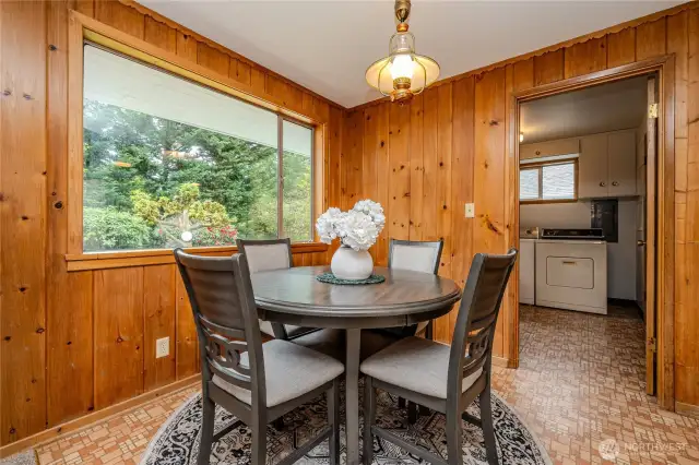 More pretty backyard views can be enjoyed from the Breakfast Nook. Love the rustic feel of the cedar walls in this space.