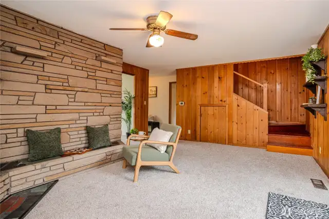 Access the comfortable Family Room from the Nook area, the entry or a doorway from the Living Room. The stairway beyond leads to a sizable upstairs Bedroom.
