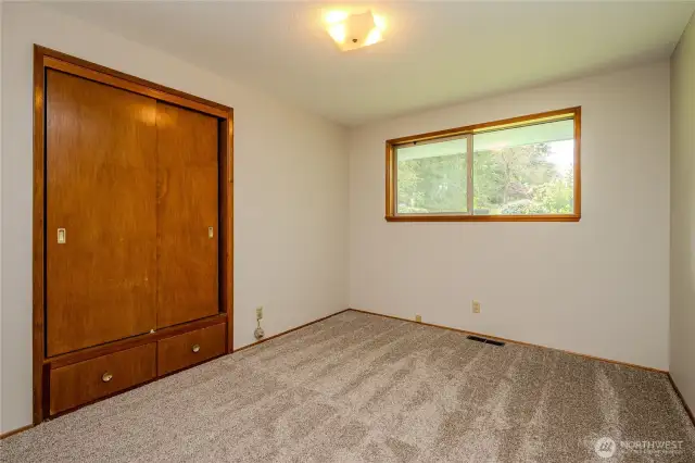 Bedroom #2 with backyard views
