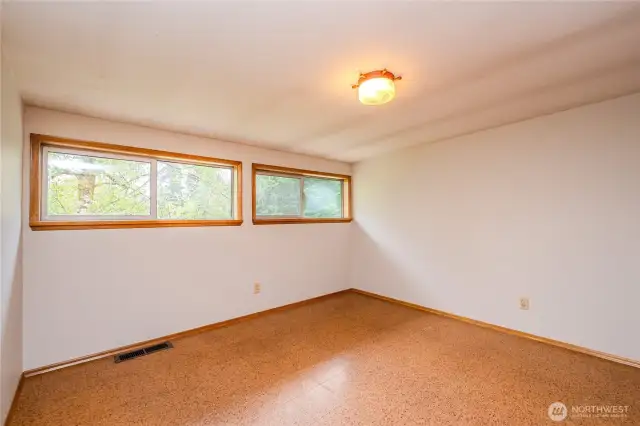 This space could also be used as a craft room, yoga or art studio or kids playroom!